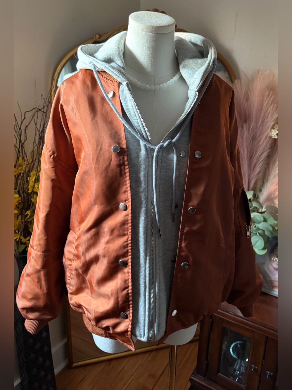 Lulu's Rust Orange Bomber Jacket with Light Gray Hoodie and fuzzy interior